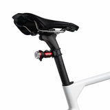 Exposure TraceR Mk4 rear light mounted on a seatpost below the saddle