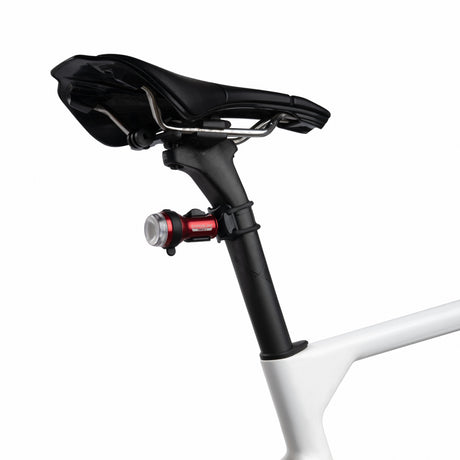 Exposure TraceR Mk4 rear light mounted on a seatpost below the saddle
