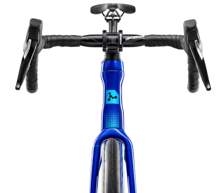 Close-up of a bicycle handlebar with blue fork on a white background