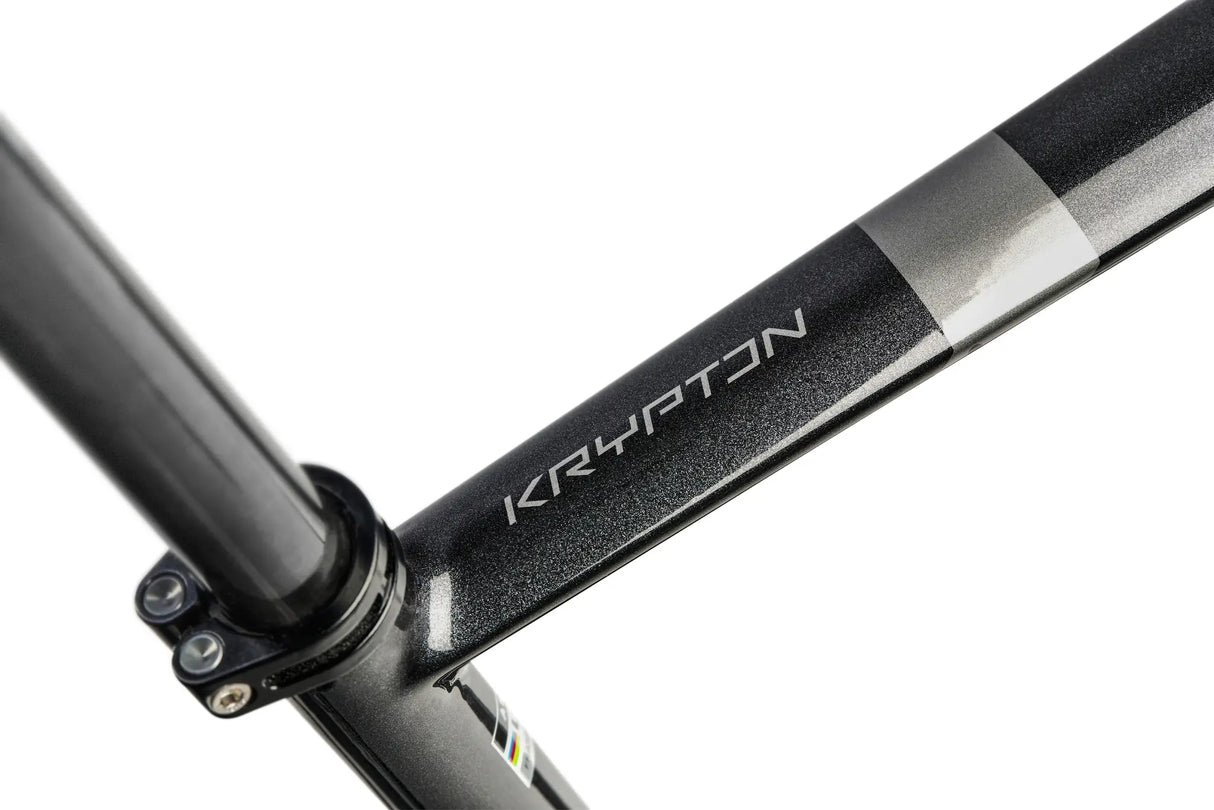 Close-up of a bicycle frame with 'Krypton' branding on a white background
