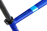 Close-up of a blue bicycle frame with 'Krypton' branding on a white background
