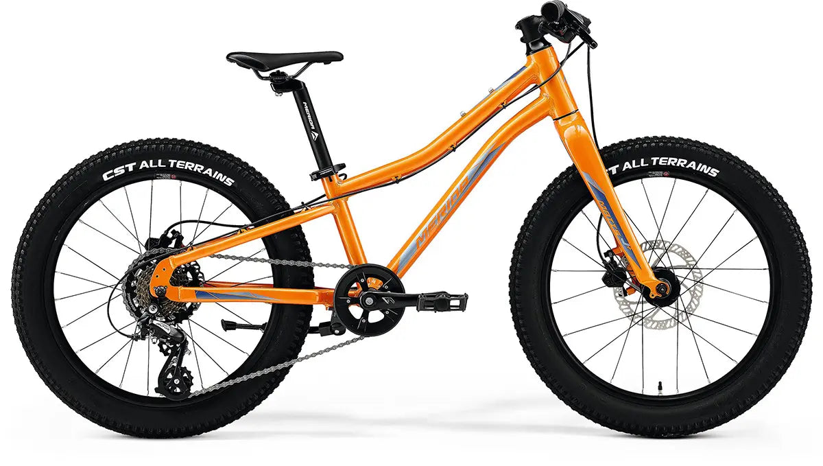 Merida Matts J.20+ Kids Hybrid Bike in vibrant orange, featuring a lightweight frame and durable CST All Terrains tires for enhanced performance.