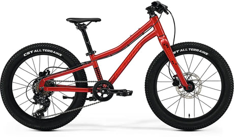 2025 Merida Matts J.20+ Kids Hybrid Bike in vibrant red, featuring a durable frame, wide tires, and reliable disc brakes for all-terrain adventures.