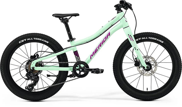 2025 Merida Matts J.20+ Kids Hybrid Bike in mint green with a lightweight frame, CST All Terrains tires, and disc brakes for superior control.