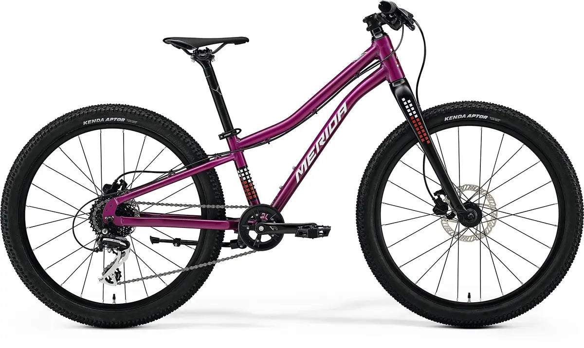 Merida Matts J.24+ Hybrid Kids Bike in purple featuring a durable frame, 24-inch wheels, and disc brakes for versatile cycling.