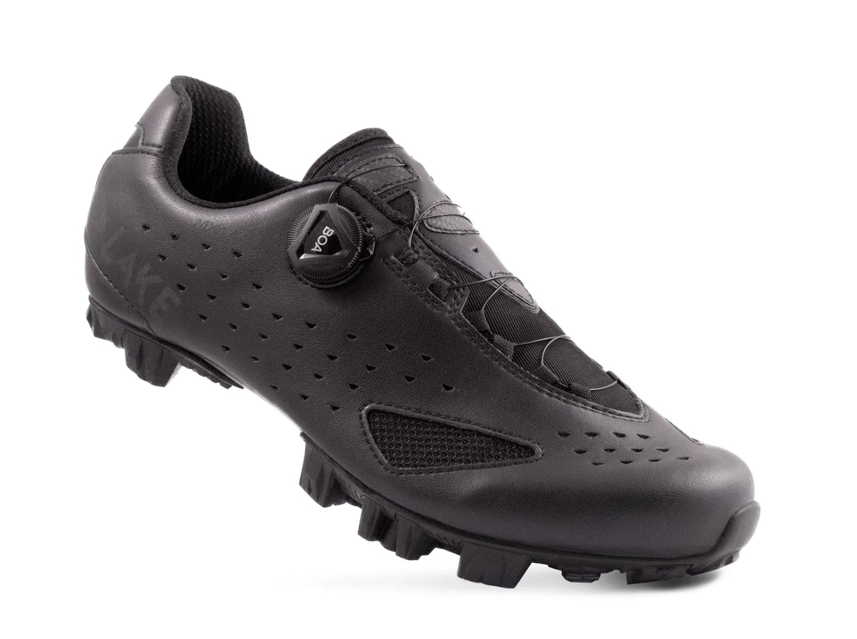Black cycling shoe with sole pattern on a white background