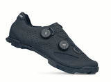 Black cycling shoe with velcro straps on a white background