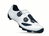 White cycling shoe with black accents on a white background