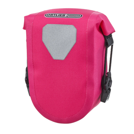 Compact cyber pink Ortlieb Micro-Bag saddle bag with reflective gray patch and black mounting clips.
