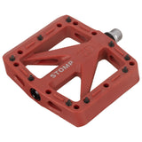 Red Oxford Stomp nylon flat bicycle pedal with CroMo spindle and replaceable steel pins.