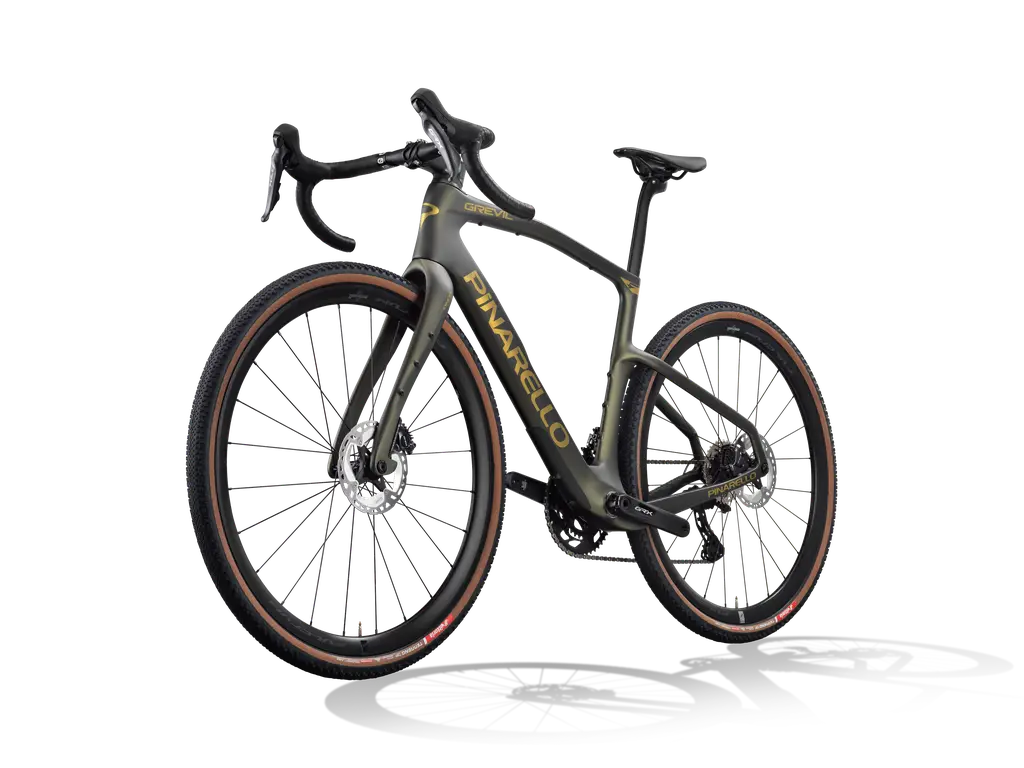 Carbon fiber bicycle with 'Pinarello' branding on a white background