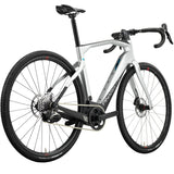 Rear angled view of Pinarello Nytro Gravel E5 Rival AXS Electric Gravel Bike showcasing SRAM drivetrain and robust gravel tires for rugged terrain.