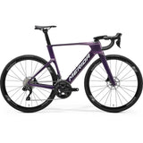 Merida Reacto 5000 aero road bike in purple and white, side view on a white background