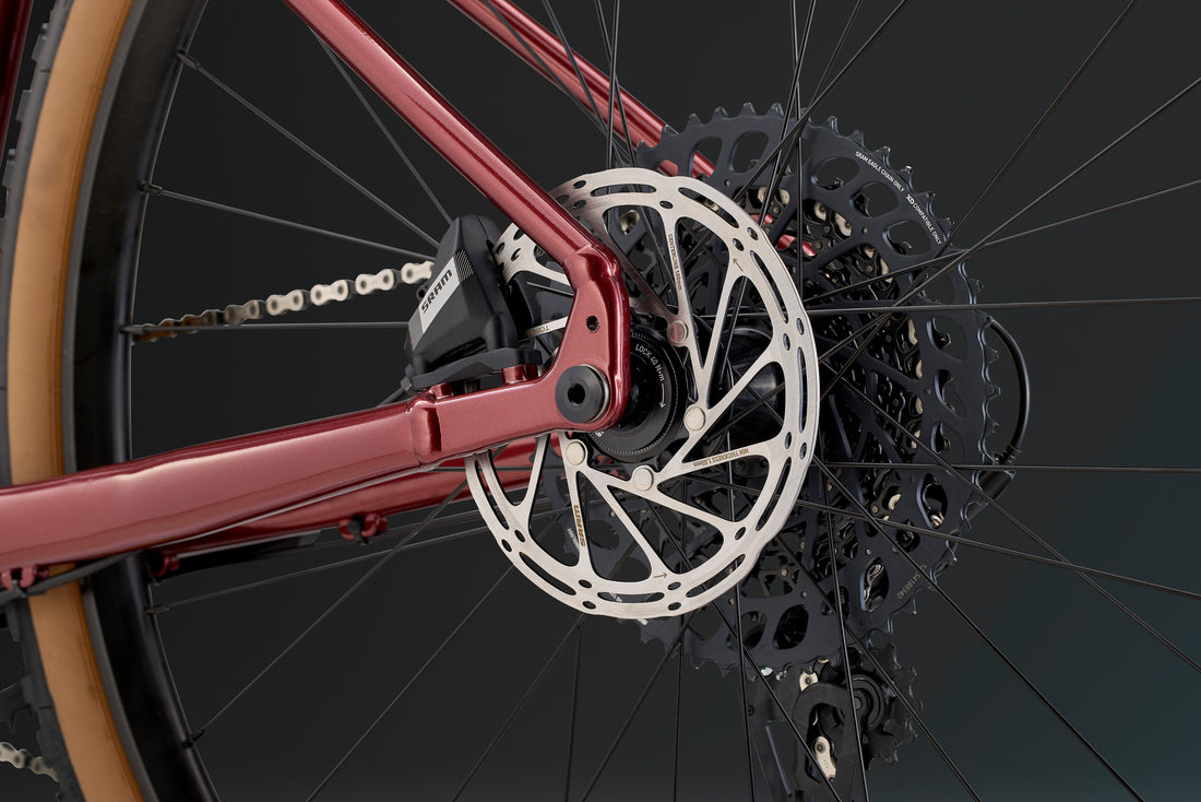 Close-up of the Whyte Verro Gravel Bike's rear disc brake and derailleur, built for reliable stopping power and smooth shifting.