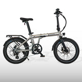 Silver estarli E20.8 Play Hybrid E-Bike featuring a foldable frame and rear rack, perfect for commuting and compact storage.