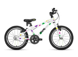 Frog 44 first pedal kids bike in white with coloured spot graphics, side view