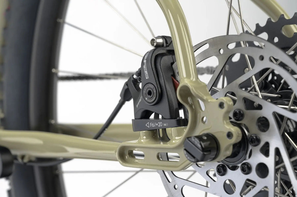 Rear disc brake system on the Genesis Vagabond 10 Gravel Bike, providing reliable stopping power for off-road and gravel riding.