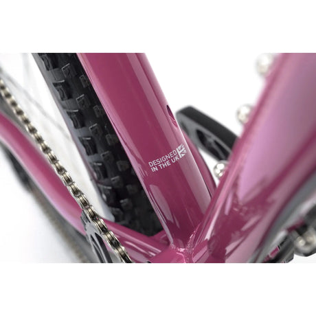 Genesis Vagabond 20 Gravel Bike frame detail with 'Designed in the UK' marking, emphasizing its high-quality engineering.