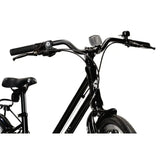 The image captures a close-up of the handlebars and front section of a sleek black Frog City 61 Kids Hybrid Bike. Featuring a lightweight frame and curved handlebars, this design ensures agility and comfort. The partially visible saddle suggests the practicality of an 8-speed gear setup, ideal for versatile rides.