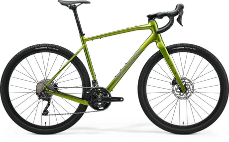 Merida Silex 400 Gravel Bike in metallic green, featuring a lightweight aluminum frame, carbon fork, and Shimano GRX drivetrain for versatile off-road performance.