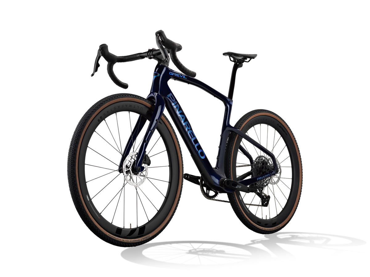 Lapland Sky Pinarello Grevil F5 gravel bike from a front three-quarter angle, non-drive side.
