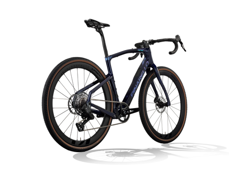 Lapland Sky Pinarello Grevil F5 gravel bike from a rear three-quarter angle showing the rear derailleur and cassette.