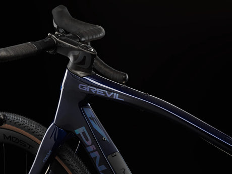 Top tube of the Lapland Sky Pinarello Grevil F5 with the Grevil logo, stem and handlebar.