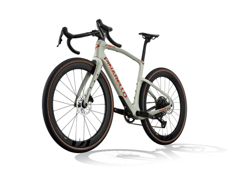 Moab Amber Pinarello Grevil F7 gravel bike from a front three-quarter angle, non-drive side.