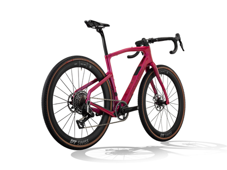 Lunar Bloom Pinarello Grevil F9 gravel bike from a rear three-quarter angle showing the rear derailleur and cassette.