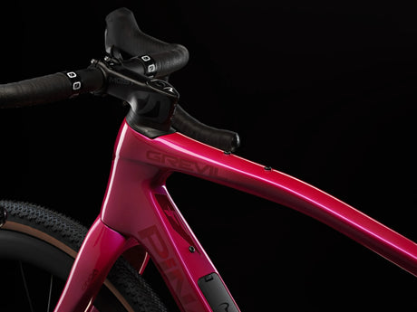 Top tube of the Lunar Bloom Pinarello Grevil F9 with the Grevil logo, stem and handlebar.