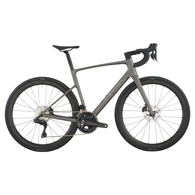 Matte tungsten grey Scott Addict 20 road bike with carbon frame, deep-section aerodynamic wheels, and disc brakes.