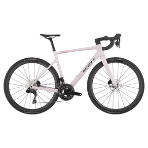 Scott Addict 30 Road Bike in pink, equipped with a carbon frame, Shimano drivetrain, and disc brakes for enhanced cycling efficiency.