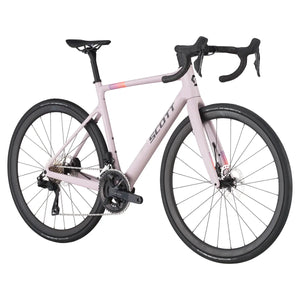 Angled view of the Scott Addict 30 Road Bike in pink, highlighting its sleek design, lightweight frame, and high-performance features.