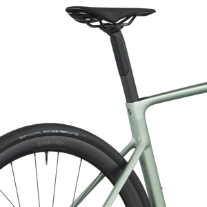 Close-up of a bicycle seat and frame on a white background