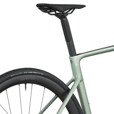 Close-up of a bicycle seat and frame on a white background