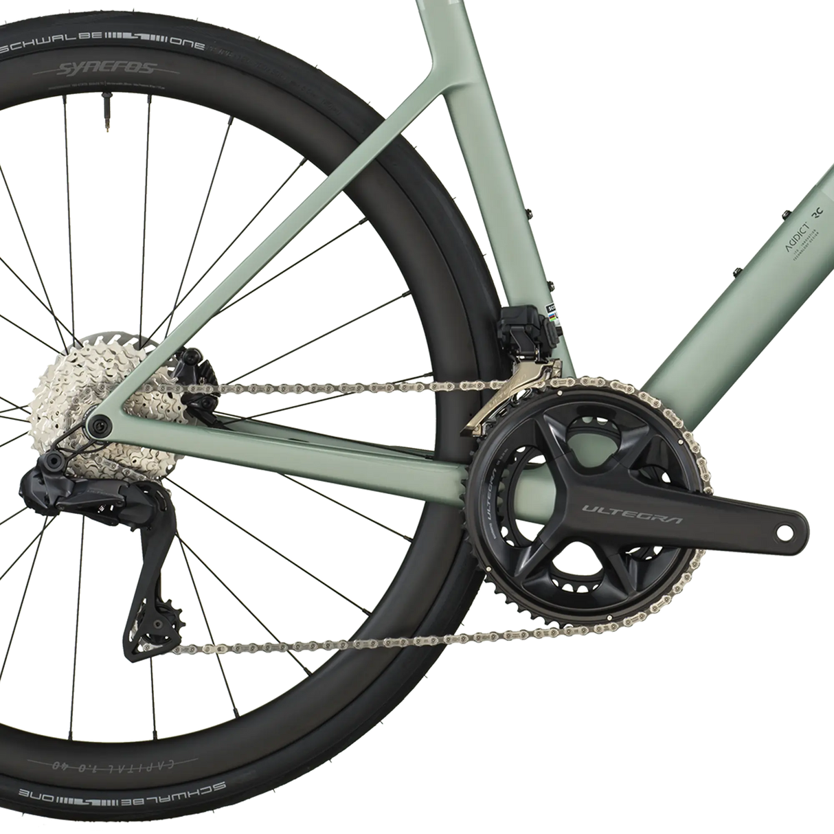 Close-up of a bicycle chain and gear system on a white background