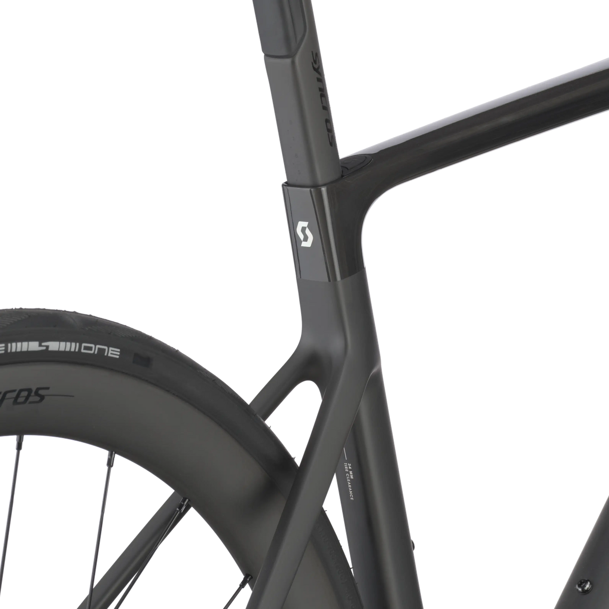 Close-up of a black bicycle frame with visible branding on a white background