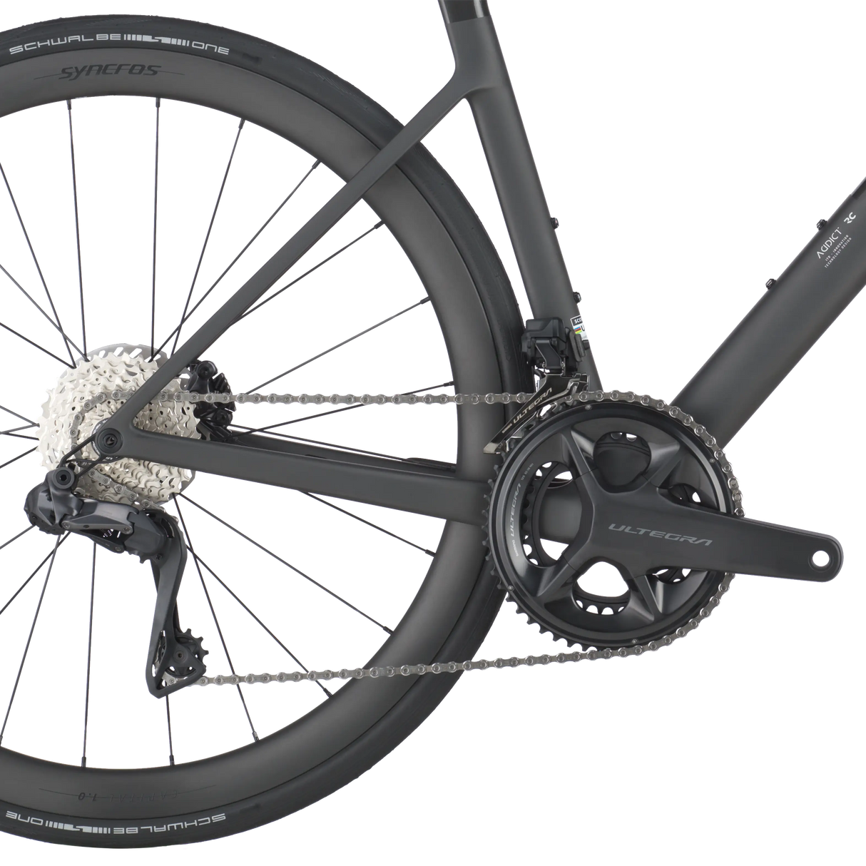 Close-up of a bicycle chain and gear system on a white background