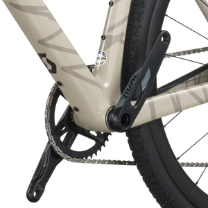 Close-up of a bicycle chain and gear system on a white background