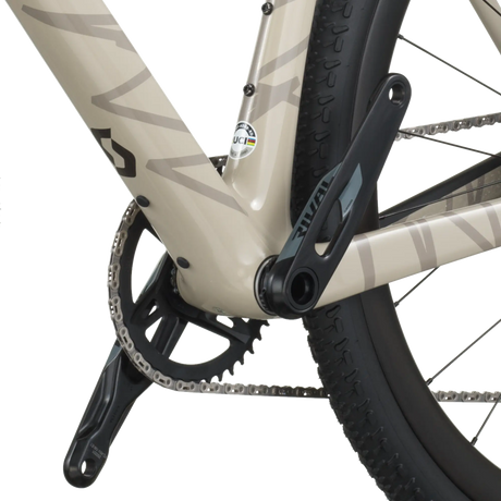 Close-up of a bicycle chain and gear system on a white background