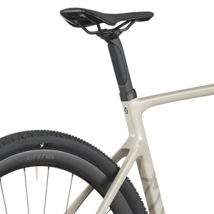 Close-up of a bicycle seat and frame on a white background