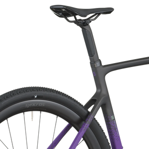 Close-up of a bicycle with a black frame and purple accents on a white background