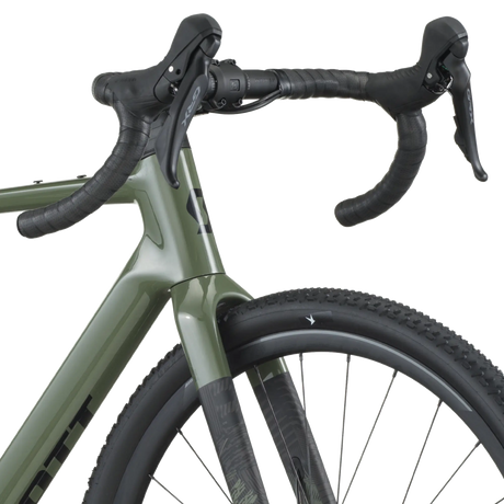 Close-up of a bicycle handlebar and front section on a white background