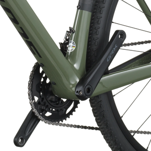 Close-up of a bicycle chain and gear system on a white background