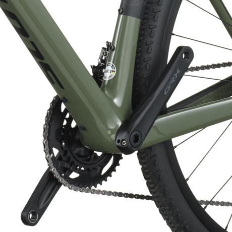 Close-up of a bicycle chain and gear system on a white background