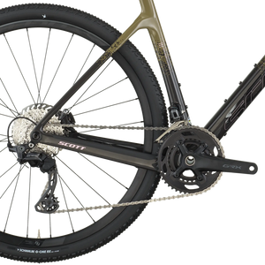 Close-up of a bicycle's rear wheel and gear system on a white background