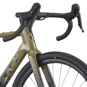 Close-up of a bicycle handlebar and front wheel on a white background