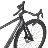 Close-up of Scott Addict RC 10 Road Bike's handlebars and front fork, highlighting integrated design and premium finish.