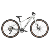 Scott Scale 600 26" Kids Bike in silver with brown Kenda tires, designed for young riders seeking performance and durability on trails.