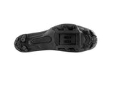 Black sole of a shoe with tread pattern on a white background